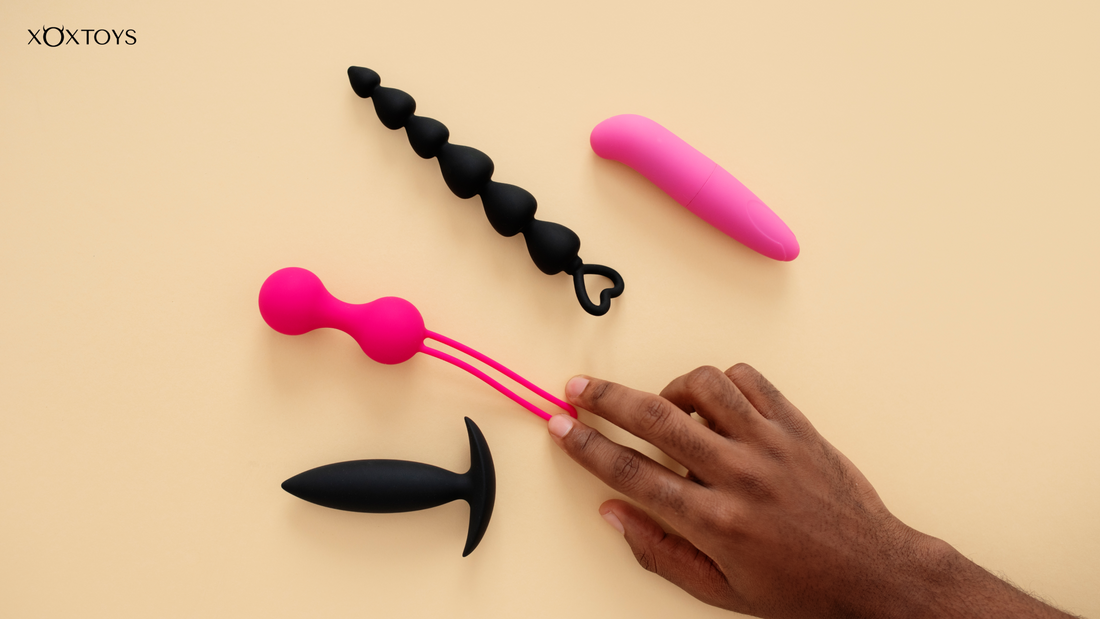 women hand with sex toys
