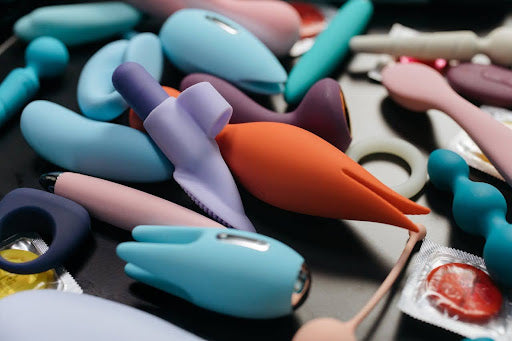 bunch of vibrators, dildos and butt plugs 